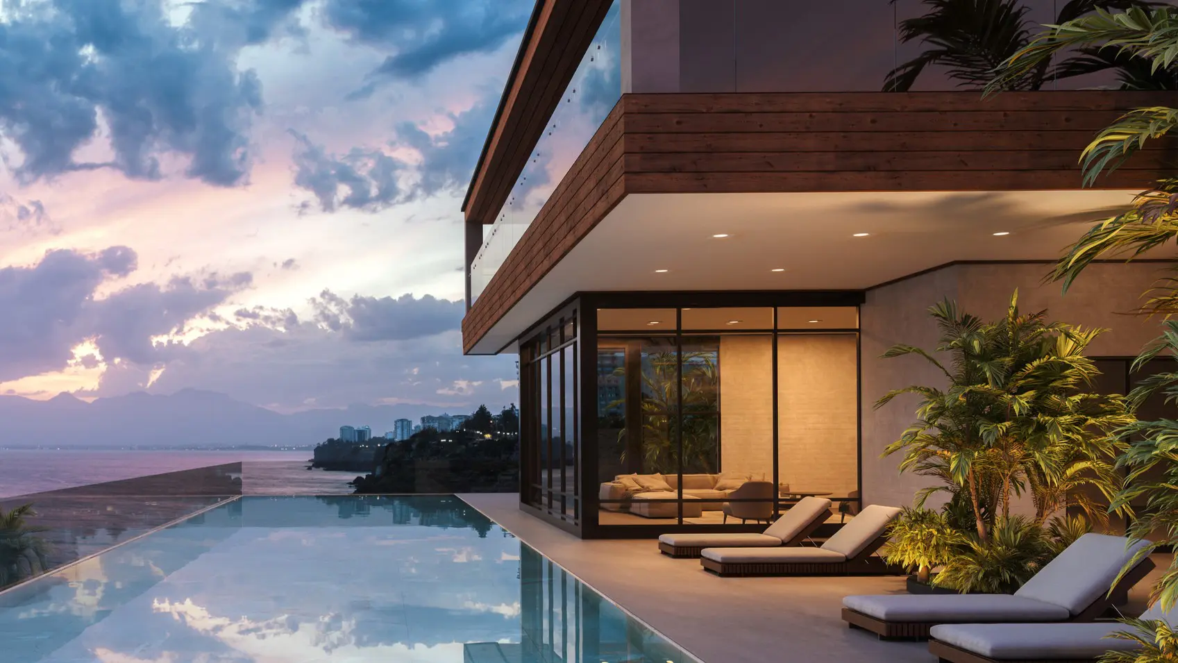 Modern villa with infinity pool at sunset