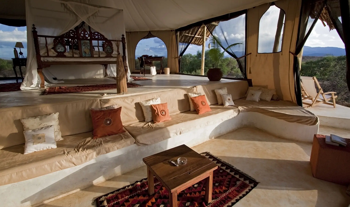 Luxury safari tent interior with seating area